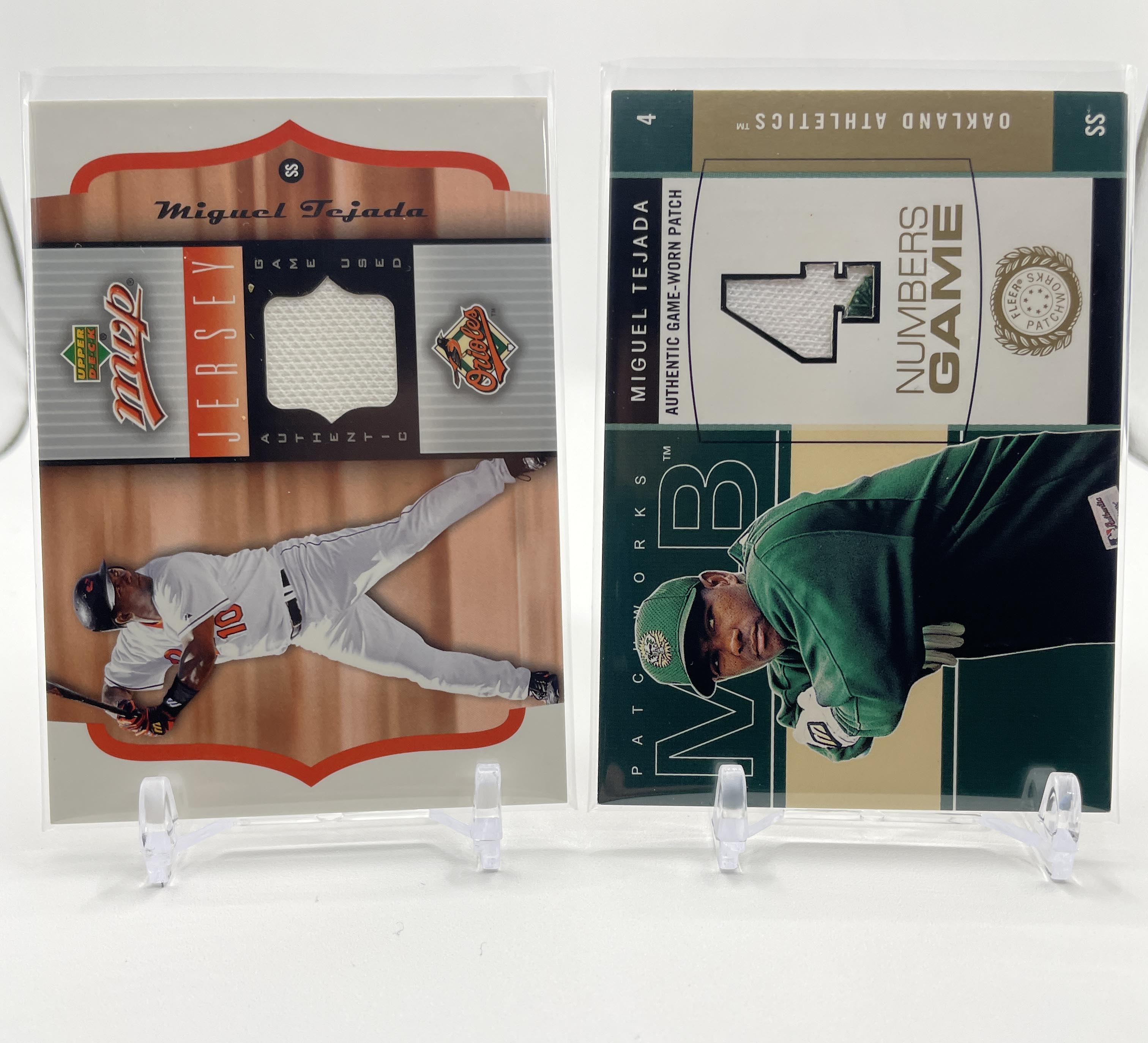 2005 Upper Deck MVP Miguel Tejada Patch + 2003 Fleer Numbers Game SP Patch /300