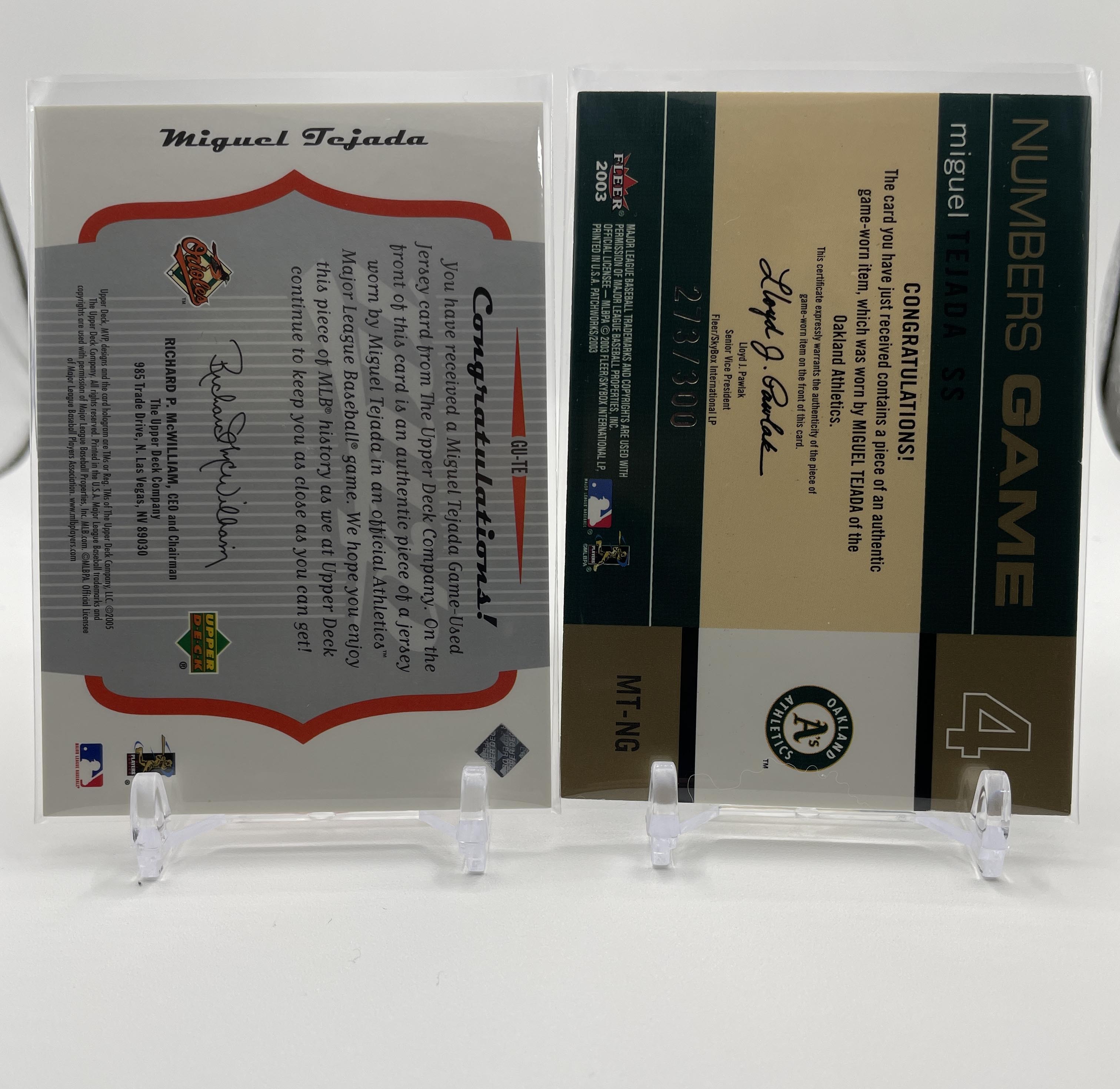 2005 Upper Deck MVP Miguel Tejada Patch + 2003 Fleer Numbers Game SP Patch /300